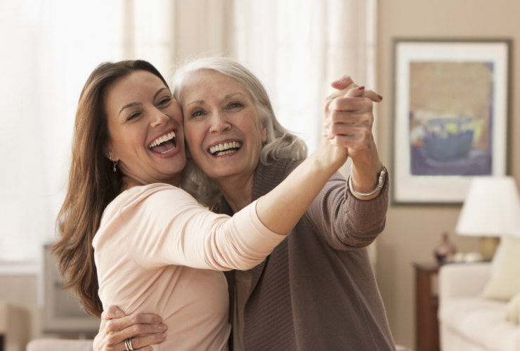 Mother and daughter dancing