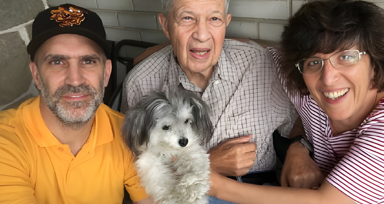 Family of Joseph Cuccia with a dog