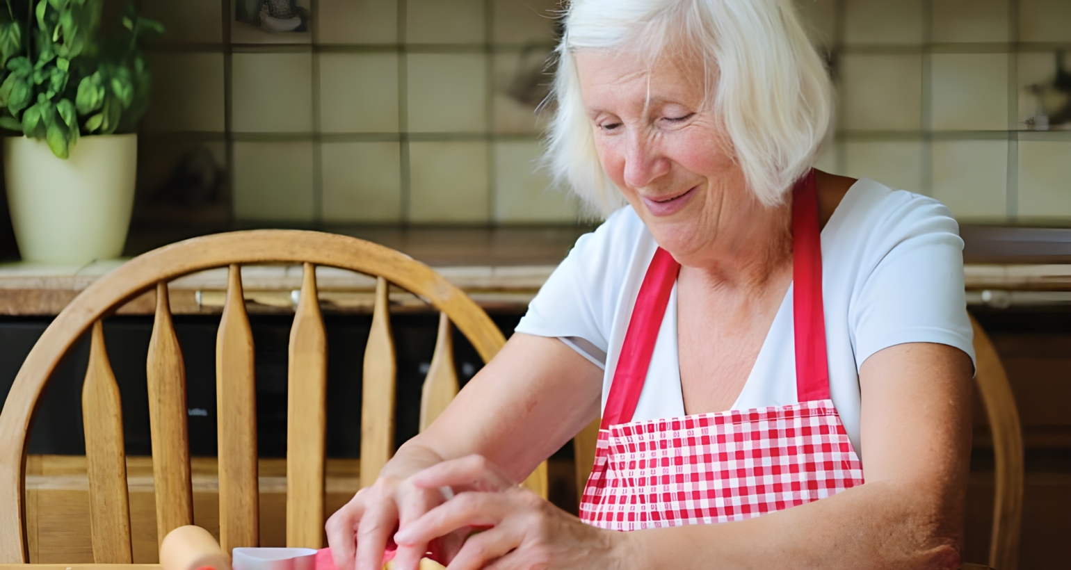 Senior woman making cookies.