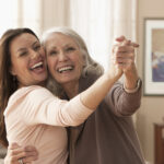 Mom and daughter dancing